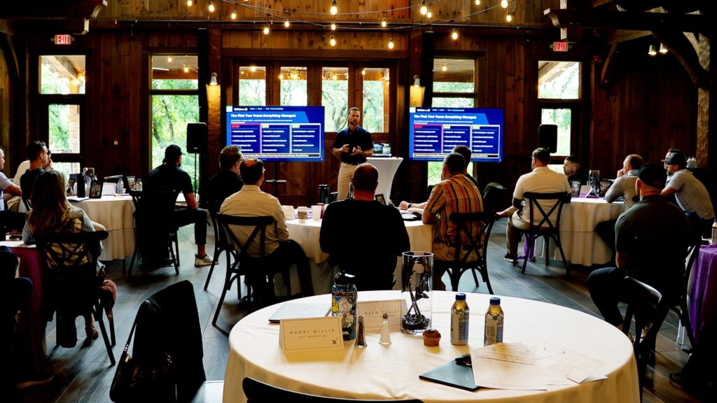 Business owners at an EXM CEO event
