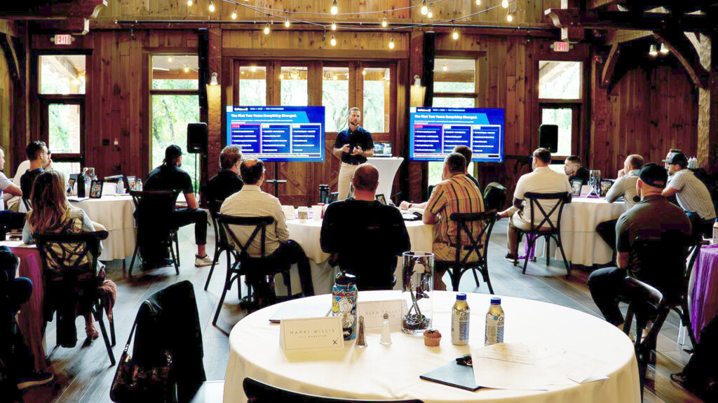 Business owners at an EXM CEO event